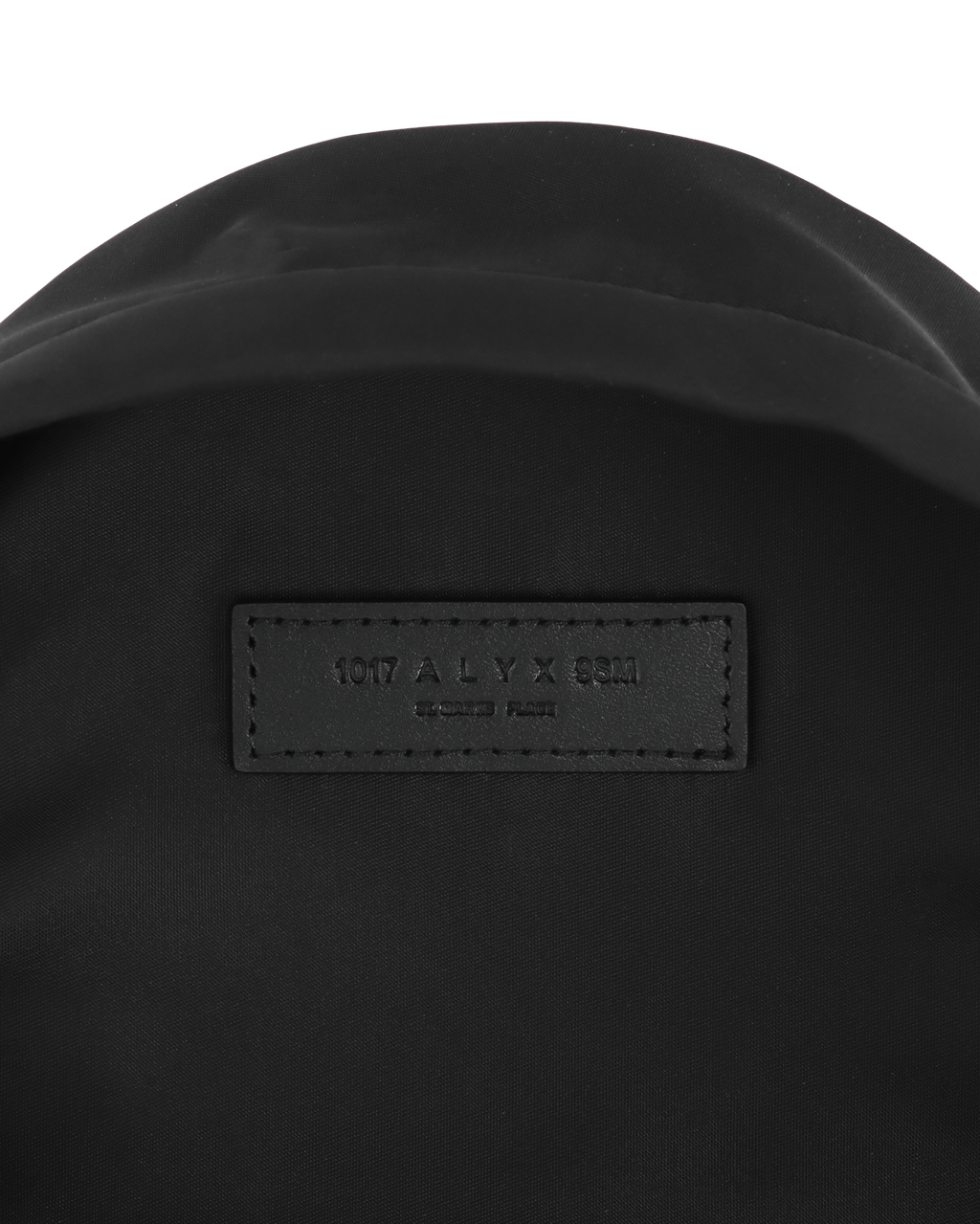 BUCKLE CROSSBODY BACKPACK